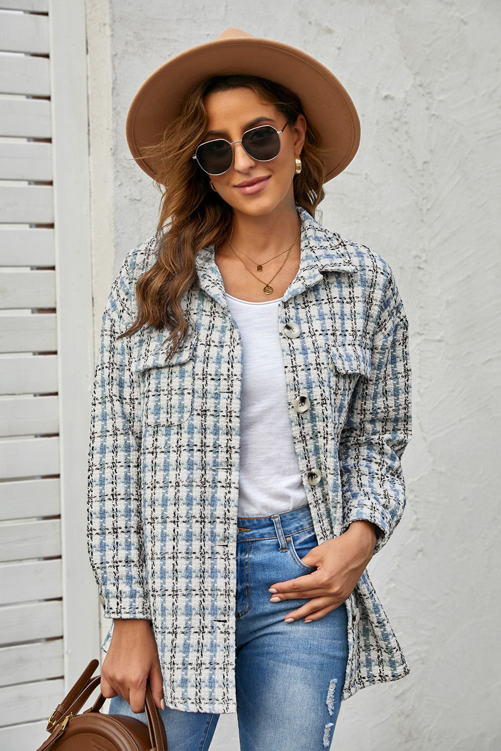 Sky Blue Plaid Print Button Knitted Jacket with Pocket, showcasing its stylish design and soft knitted fabric.