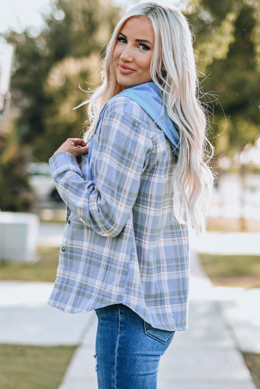 Sky Blue Plaid Print Pocket Drawstring Hooded Jacket displayed on a mannequin, showcasing its stylish design and functional features.