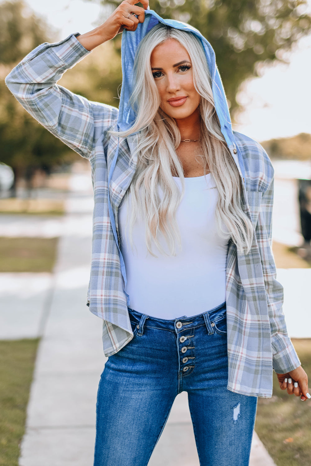 Sky Blue Plaid Print Pocket Drawstring Hooded Jacket displayed on a mannequin, showcasing its stylish design and functional features.