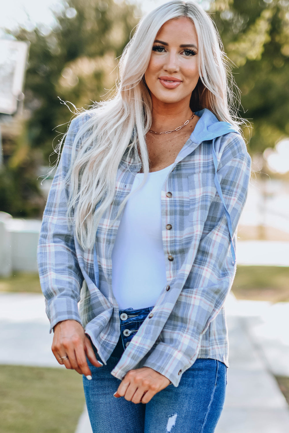 Sky Blue Plaid Print Pocket Drawstring Hooded Jacket displayed on a mannequin, showcasing its stylish design and functional features.