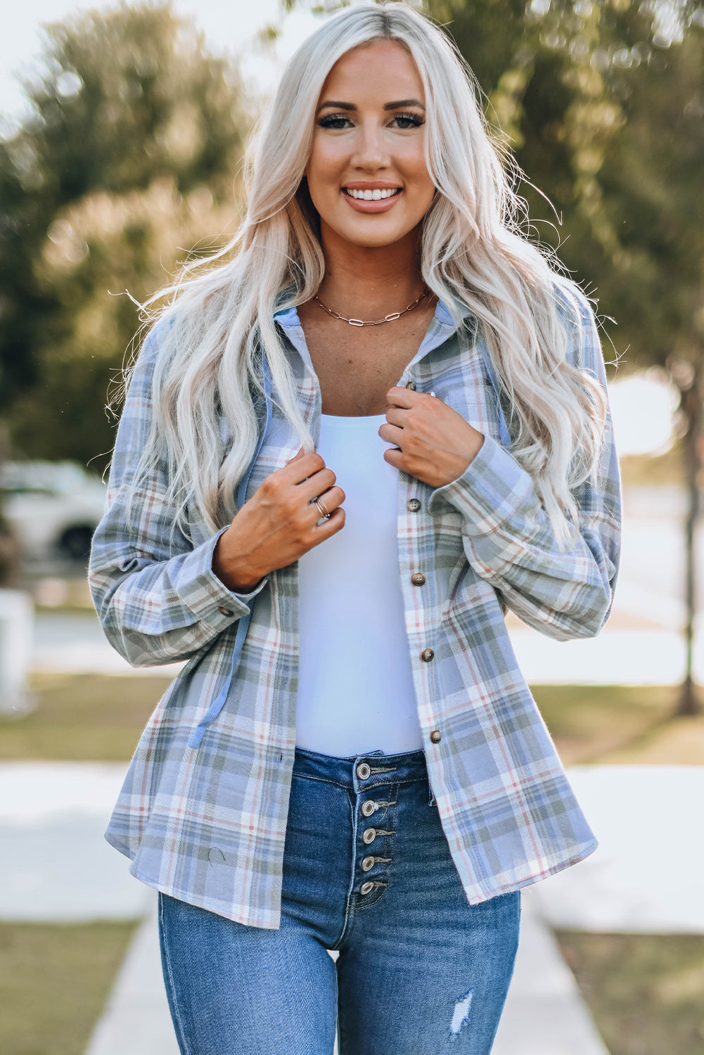 Sky Blue Plaid Print Pocket Drawstring Hooded Jacket displayed on a mannequin, showcasing its stylish design and functional features.