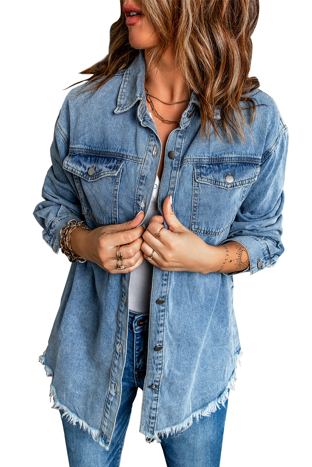 Sky blue denim jacket featuring a raw hem, button closure, and flap pocket, perfect for casual wear.