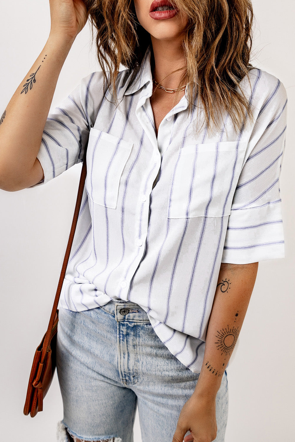 Sky Blue Pocketed Striped Shirt featuring classic stripes, short sleeves, and two bust pockets, perfect for summer wear.