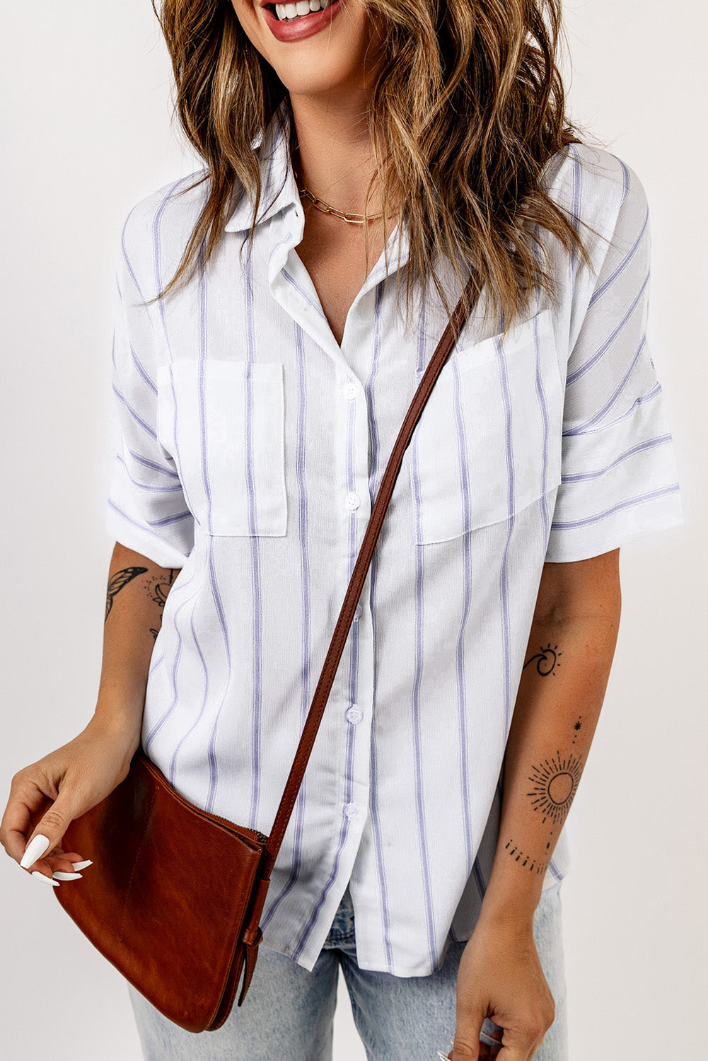 Sky Blue Pocketed Striped Shirt featuring classic stripes, short sleeves, and two bust pockets, perfect for summer wear.