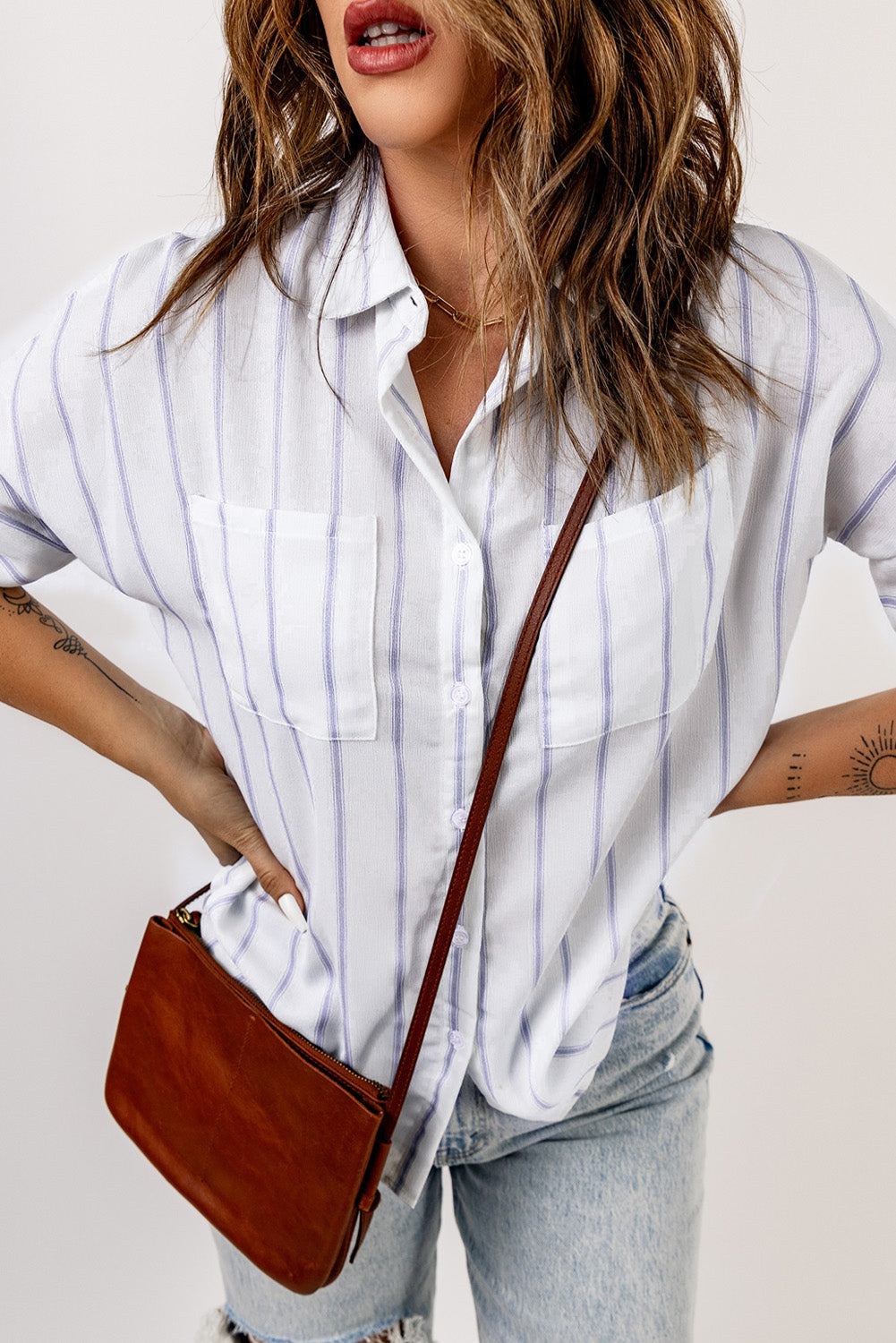 Sky Blue Pocketed Striped Shirt featuring classic stripes, short sleeves, and two bust pockets, perfect for summer wear.