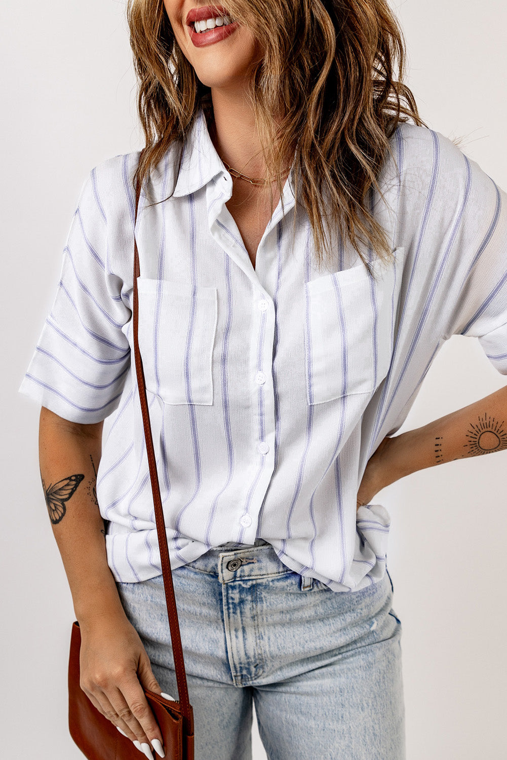 Sky Blue Pocketed Striped Shirt featuring classic stripes, short sleeves, and two bust pockets, perfect for summer wear.