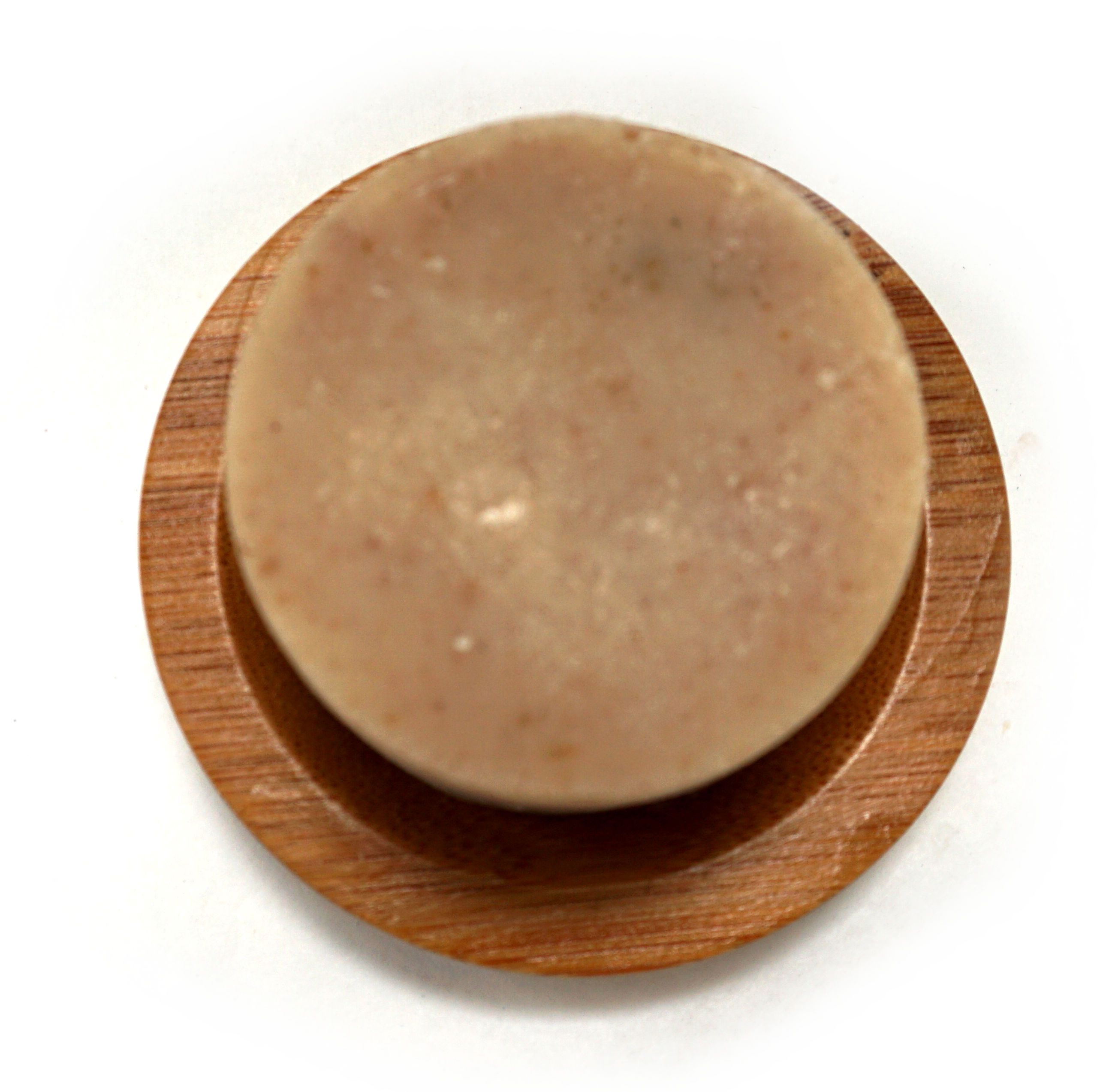 Spiced Cedar Shampoo Bar with natural ingredients, showcasing its unique design and eco-friendly packaging.