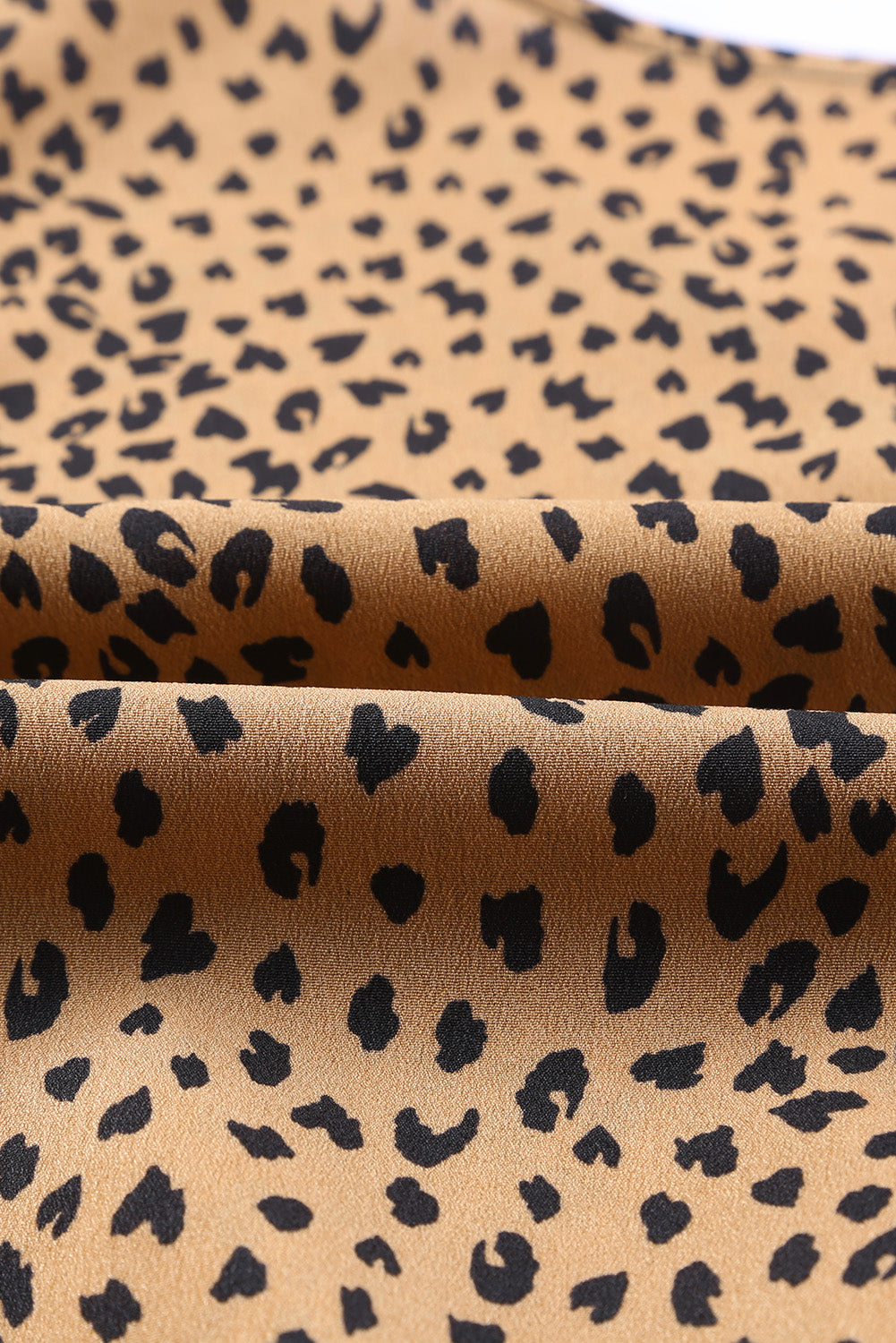 Spliced Leopard Print Wrap Long Sleeve Bodysuit featuring a stylish leopard print design and elegant wrap v-neckline.