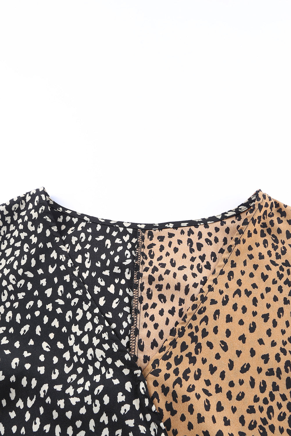 Spliced Leopard Print Wrap Long Sleeve Bodysuit featuring a stylish leopard print design and elegant wrap v-neckline.