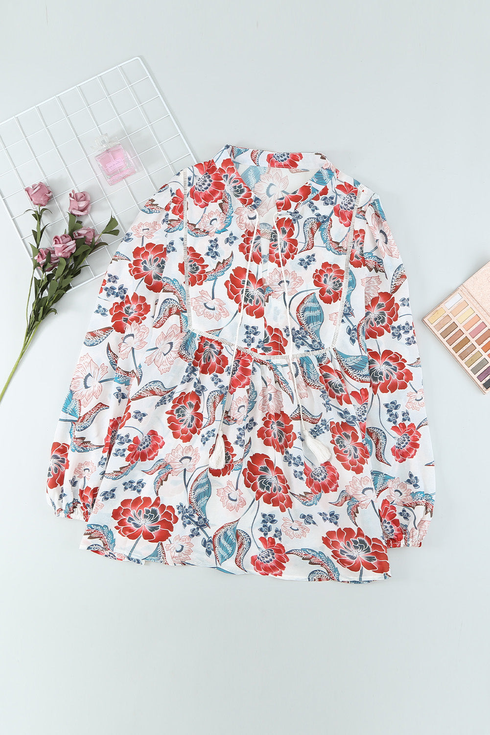 A stylish Split Neck Bubble Sleeve Floral Patchwork Blouse featuring a unique floral design, split v-neck, and bubble sleeves, perfect for casual wear.