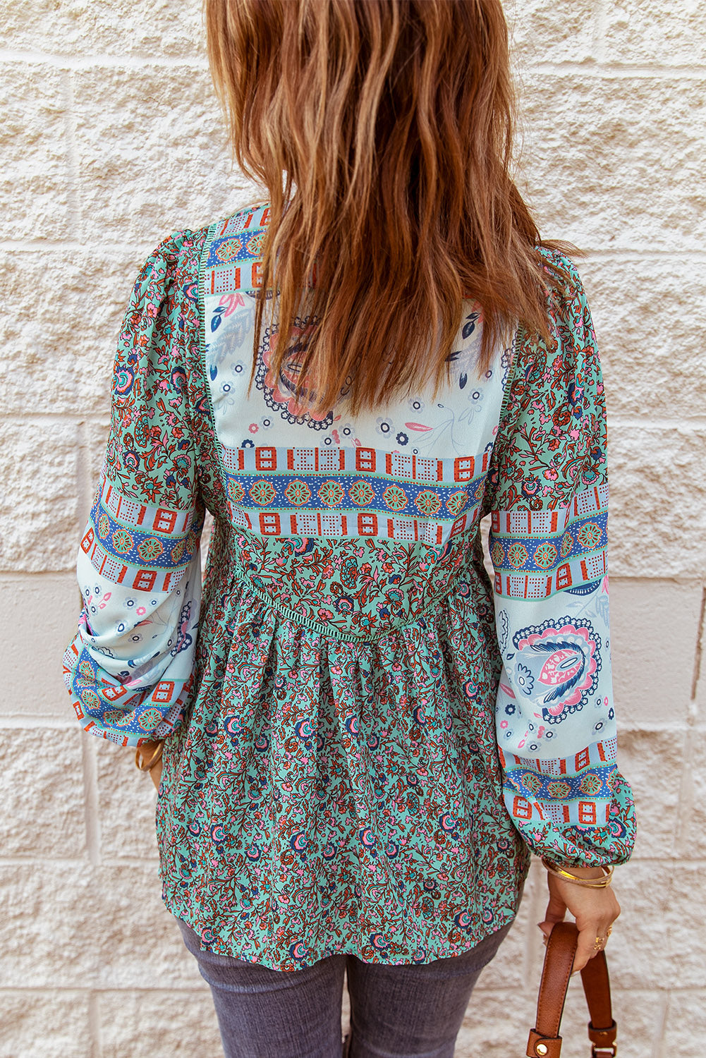 A stylish Split Neck Bubble Sleeve Floral Patchwork Blouse featuring a unique floral design, split v-neck, and bubble sleeves, perfect for casual wear.