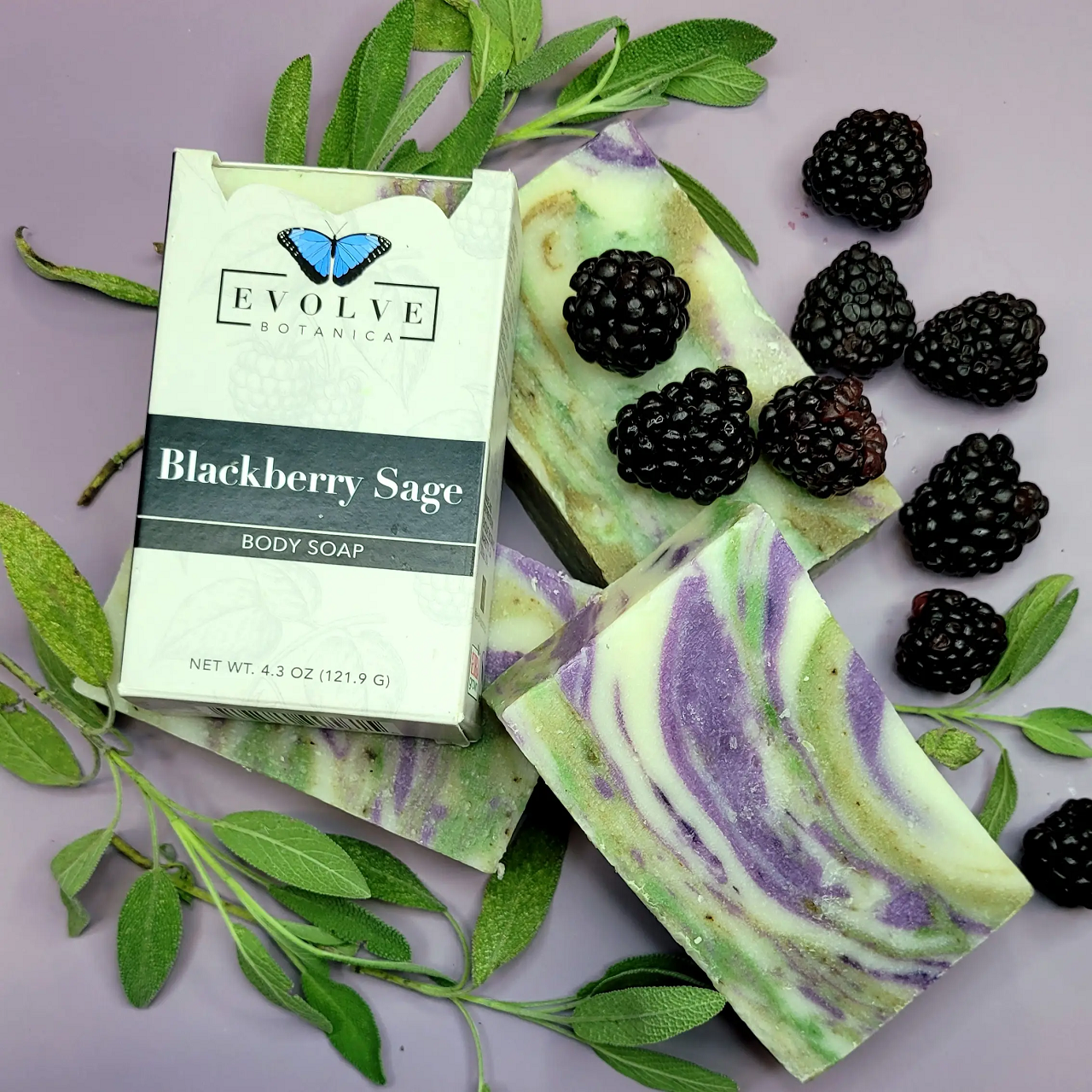 Standard Soap - Blackberry Sage bar with a rich blackberry color and sage leaves, showcasing its natural ingredients.