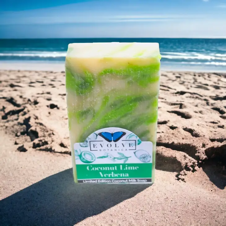 A bar of Coconut Lime Verbena soap with tropical coconut and lime scent, showcasing its natural ingredients and vibrant colors.