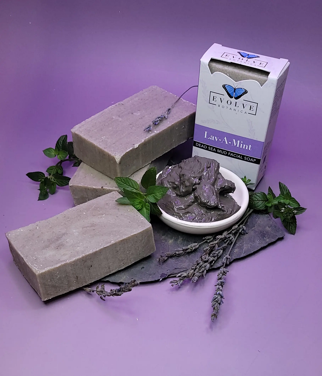 Lav-A-Mint Dead Sea Mud Facial Soap with lavender and spearmint essential oils, showcasing its rich texture and natural ingredients.