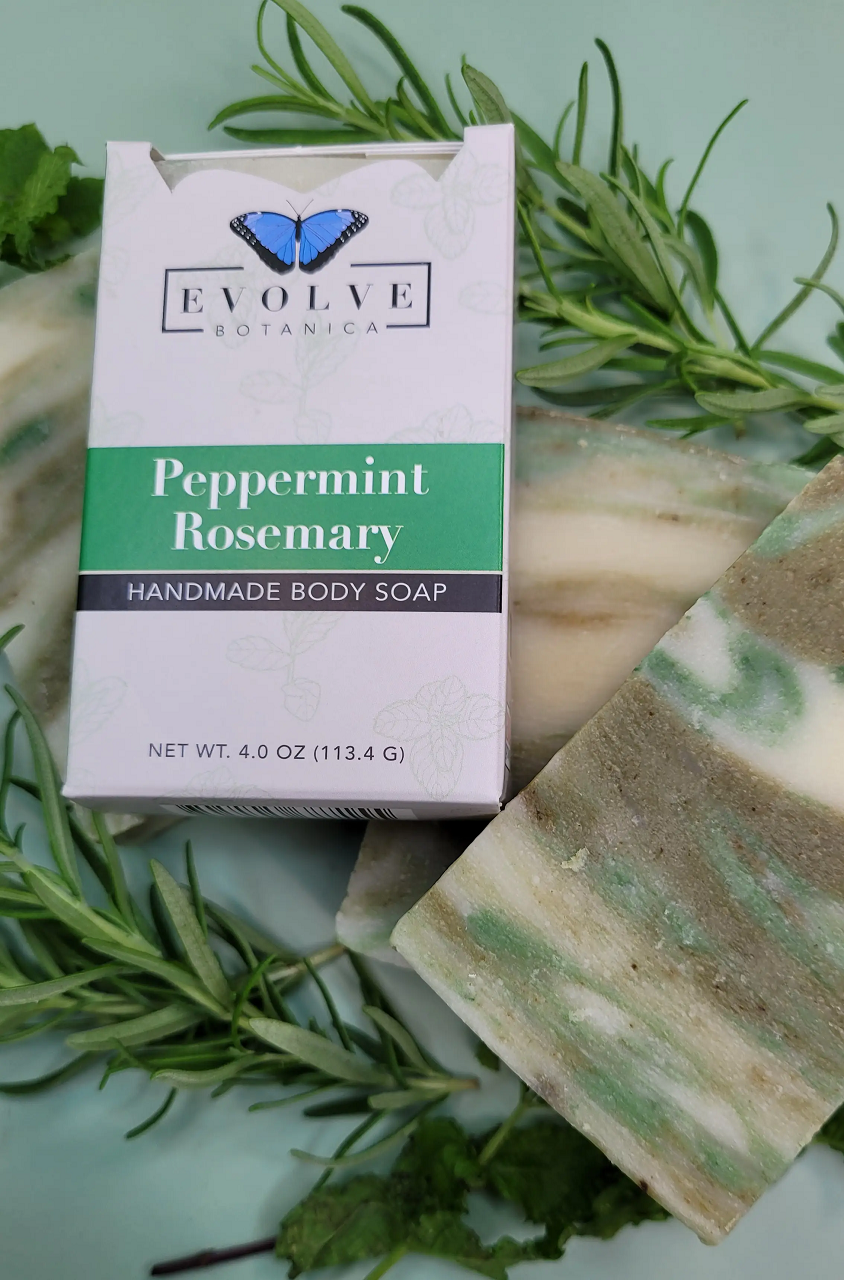 Standard Soap - Peppermint Rosemary with fresh peppermint leaves and rosemary sprigs, showcasing its natural ingredients.