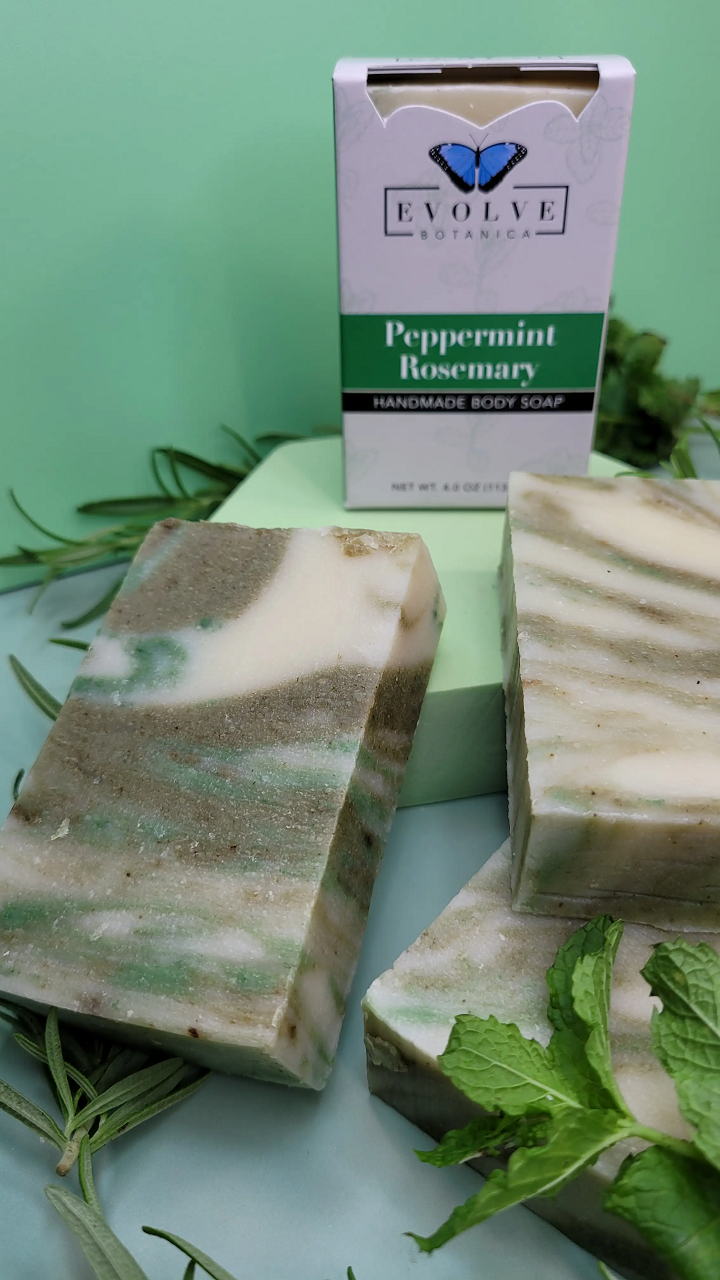 Standard Soap - Peppermint Rosemary with fresh peppermint leaves and rosemary sprigs, showcasing its natural ingredients.