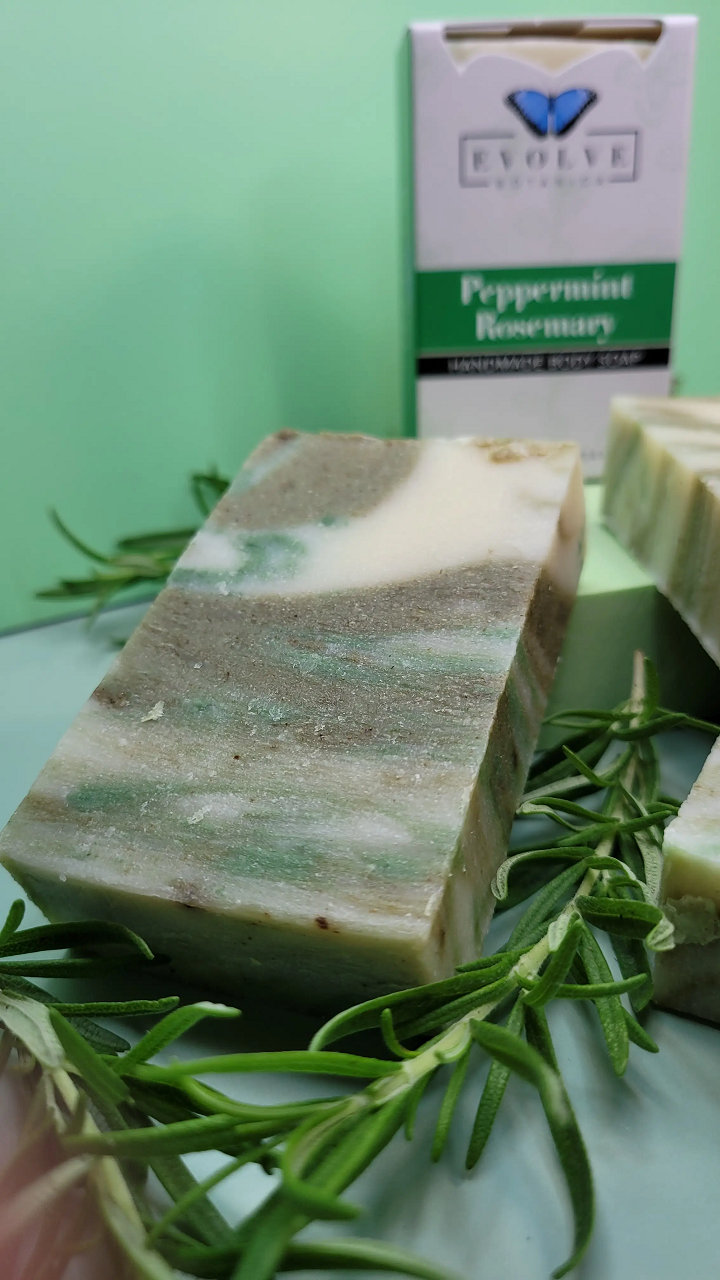 Standard Soap - Peppermint Rosemary with fresh peppermint leaves and rosemary sprigs, showcasing its natural ingredients.