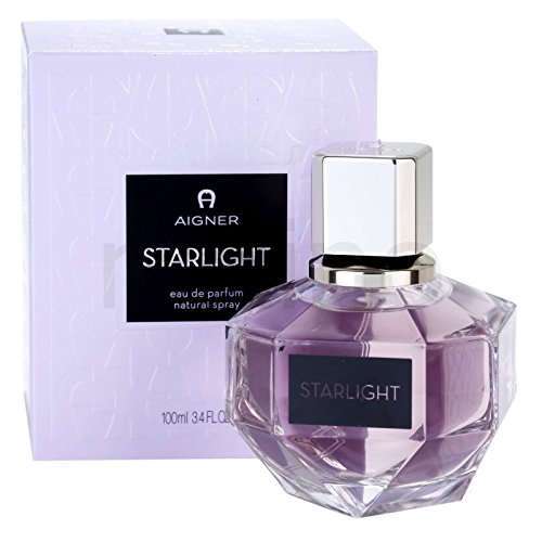 Elegant bottle of Etienne Aigner Starlight Eau de Parfum with floral design.