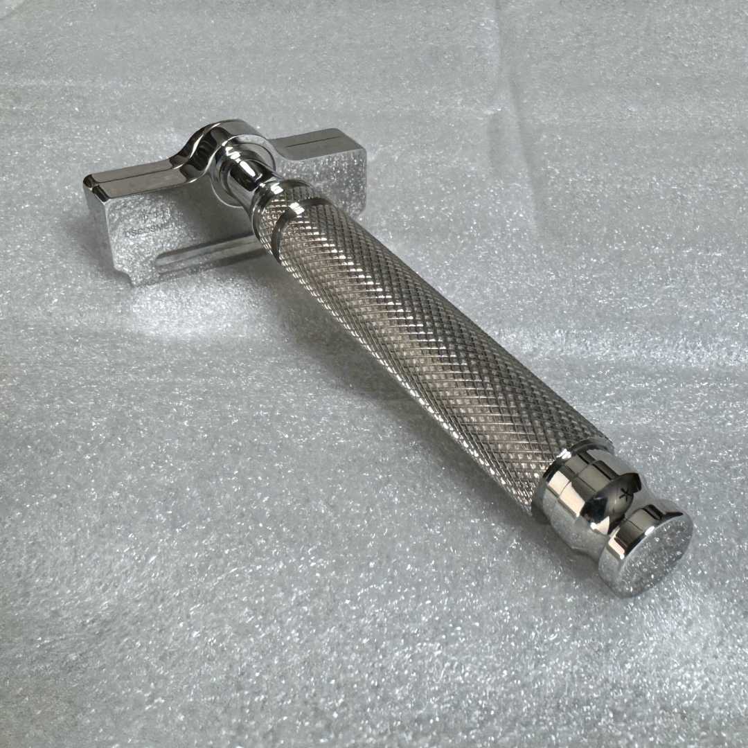 SteelMaster Razor by Shave Essentials, featuring a sleek design with a knurled handle made from durable 316 stainless steel.