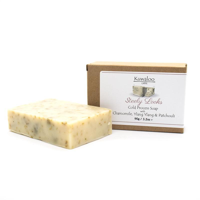 Steely Looks Soap 90g featuring chamomile, ylang ylang, and patchouli, showcasing its natural ingredients and floral scent.