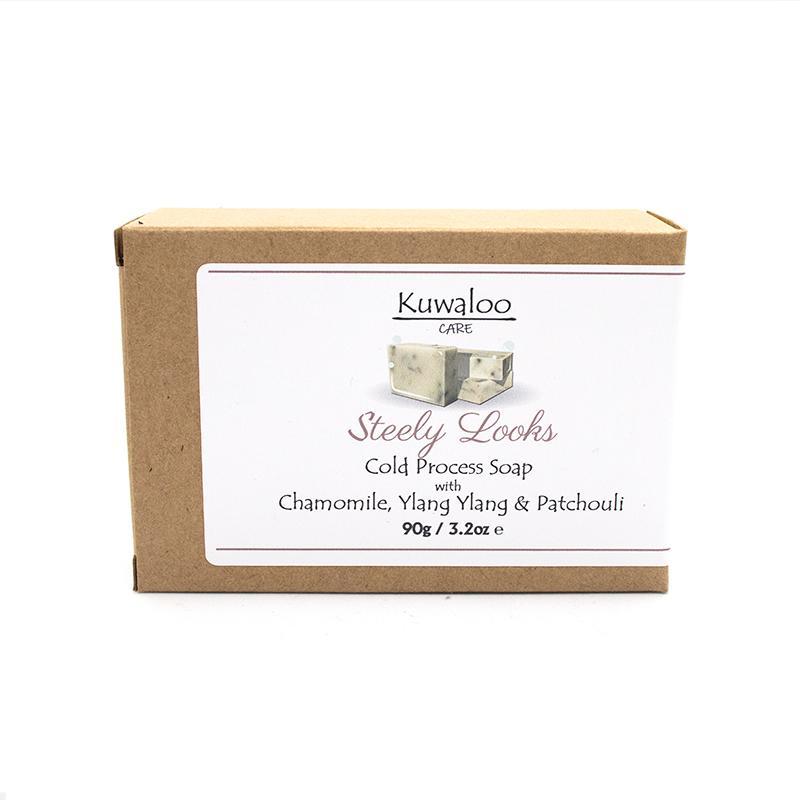 Steely Looks Soap 90g featuring chamomile, ylang ylang, and patchouli, showcasing its natural ingredients and floral scent.