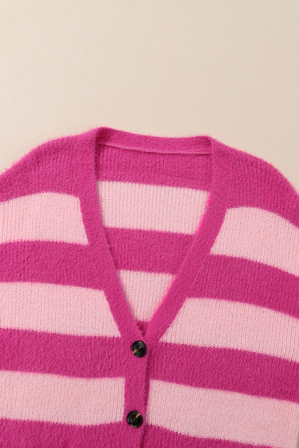 Strawberry Pink Colorblock Striped Buttoned Fuzzy Cardigan with pockets and buttons, showcasing a trendy design.