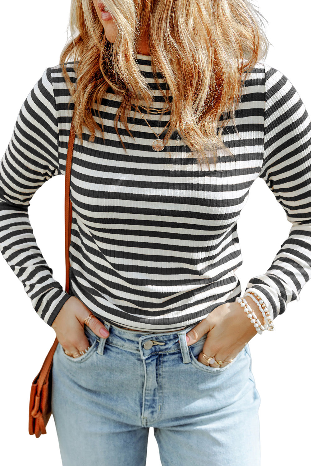 Strawberry pink striped long sleeve tee with textured knit fabric and high neck design, perfect for stylish layering.