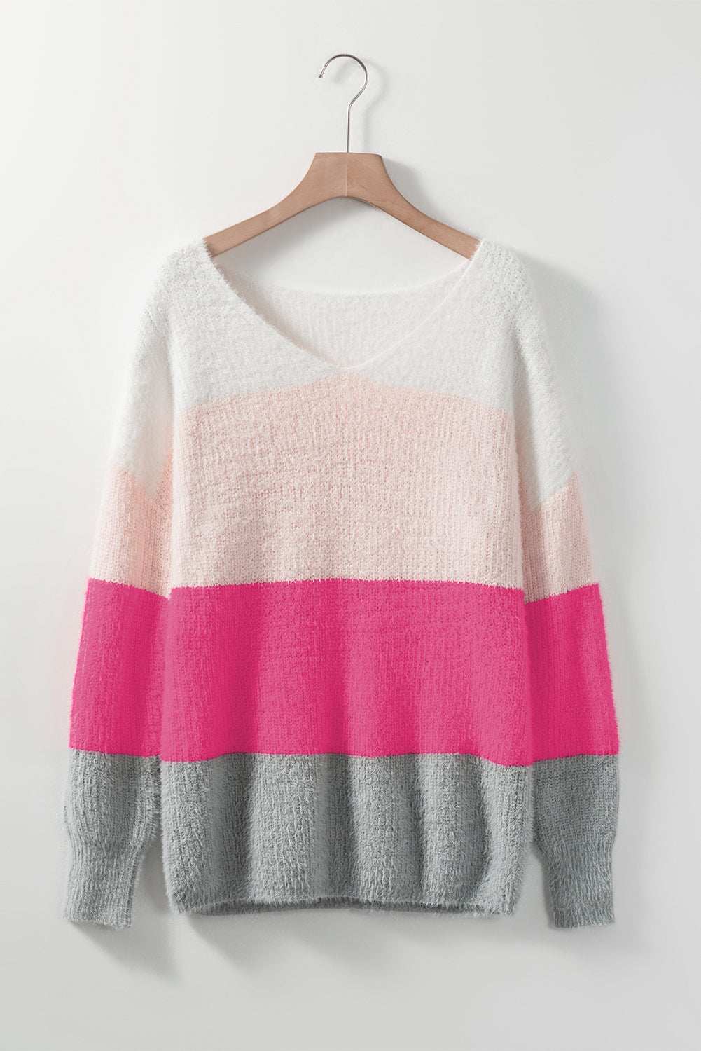 A cozy striped color block fuzzy V neck sweater in vibrant colors, perfect for chilly days and stylish outfits.