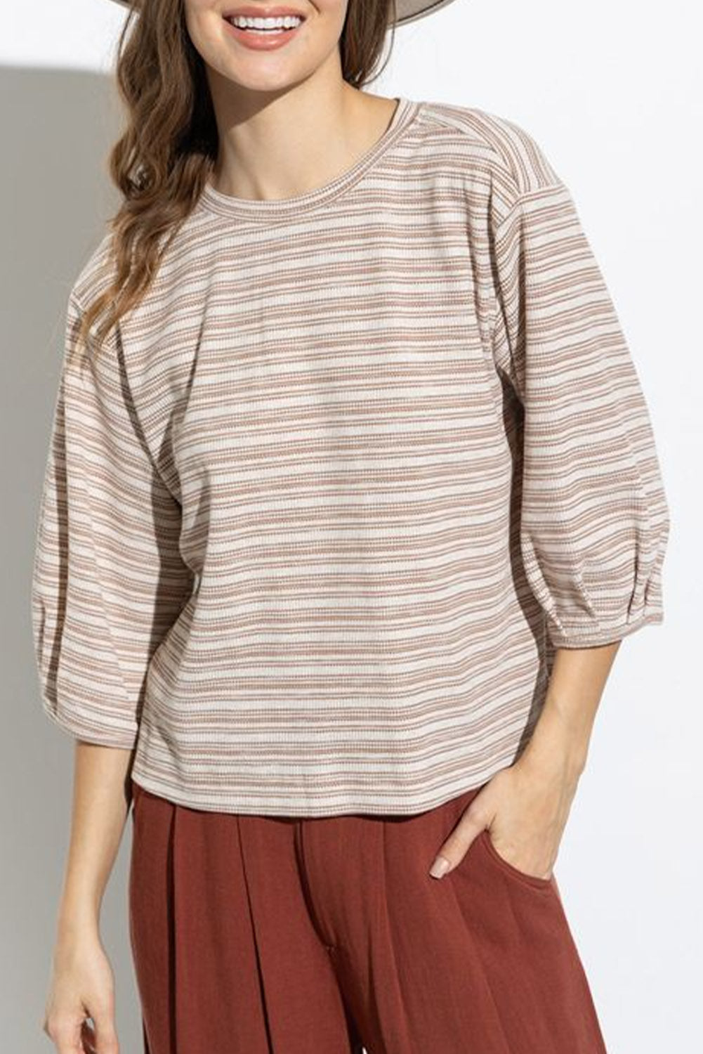 A stylish striped print crew neck top featuring elegant puff bracelet sleeves, perfect for casual outings.