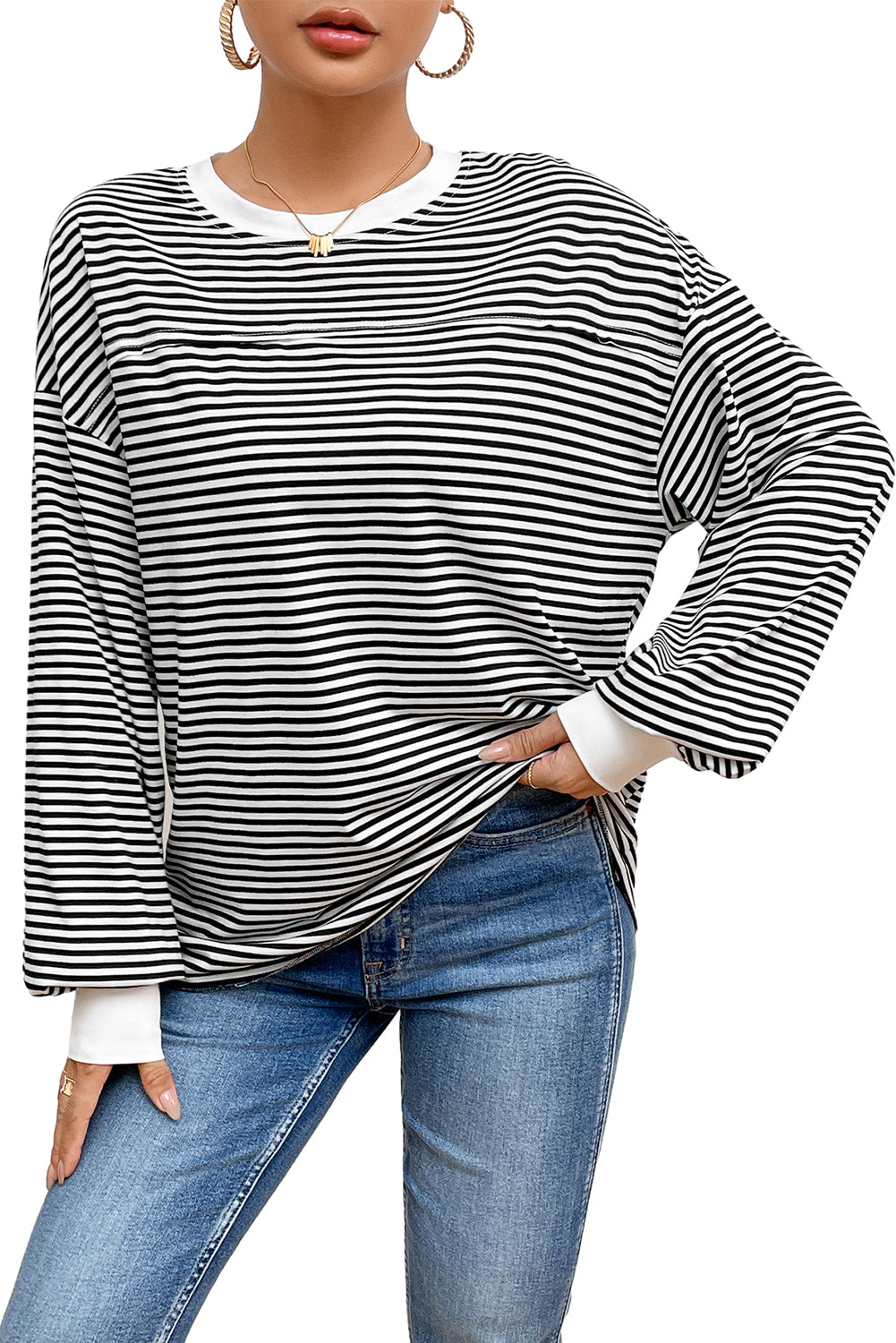 A stylish striped print drop shoulder loose sweatshirt, perfect for casual wear in cooler seasons, featuring long sleeves and a relaxed fit.