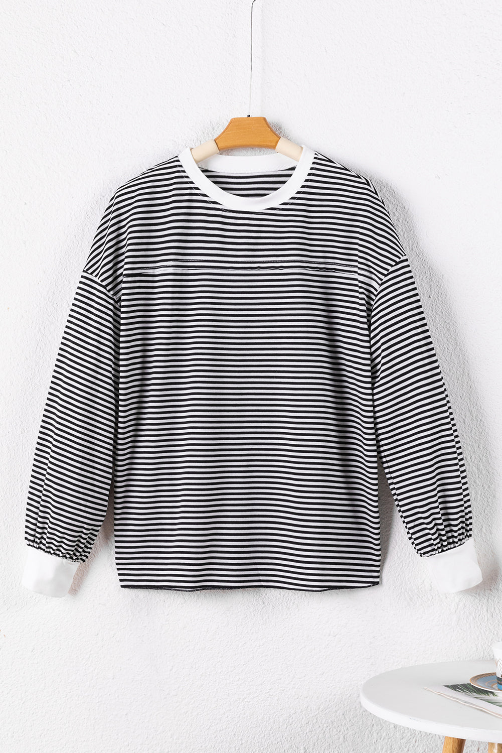 A stylish striped print drop shoulder loose sweatshirt, perfect for casual wear in cooler seasons, featuring long sleeves and a relaxed fit.