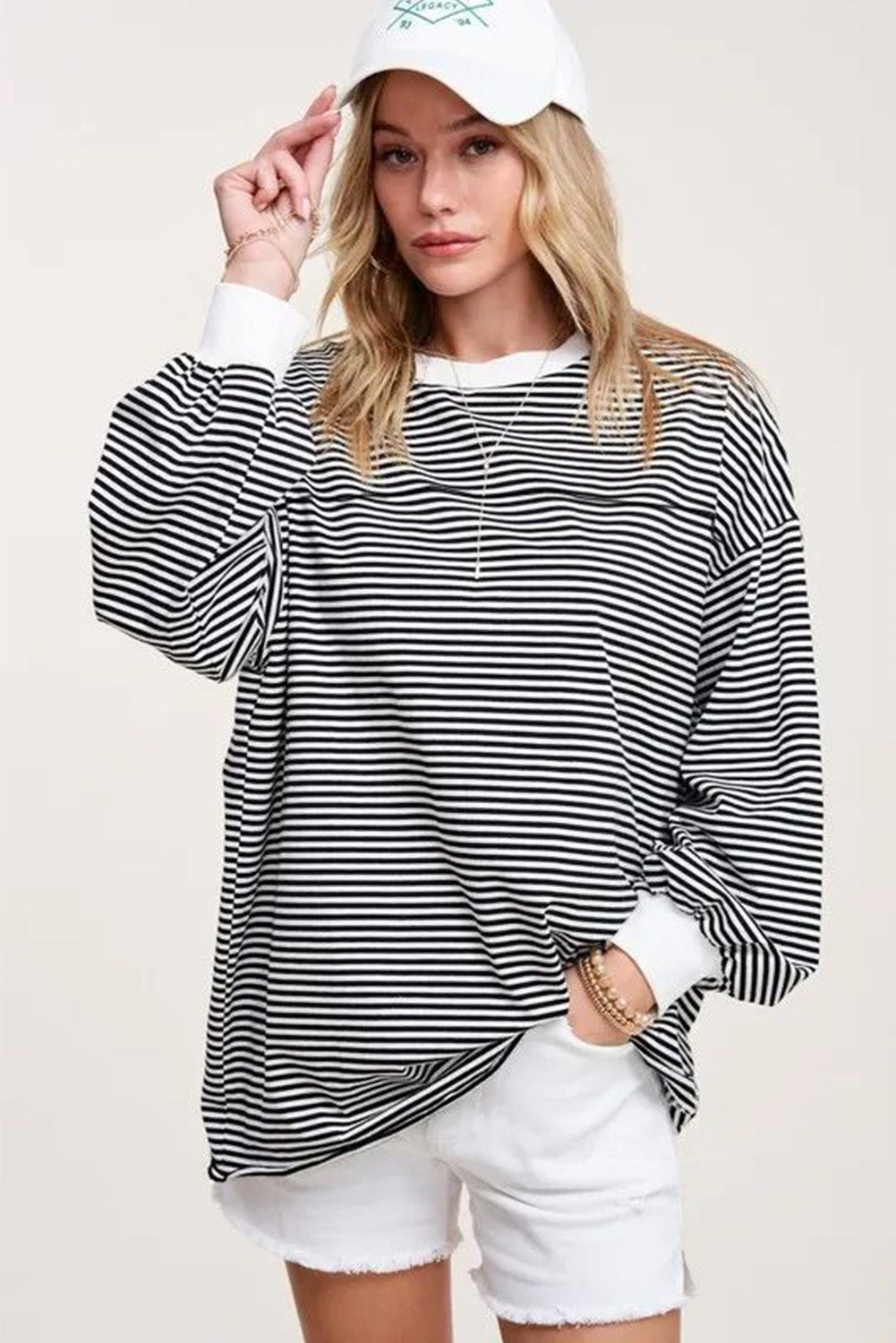 A stylish striped print drop shoulder loose sweatshirt, perfect for casual wear in cooler seasons, featuring long sleeves and a relaxed fit.