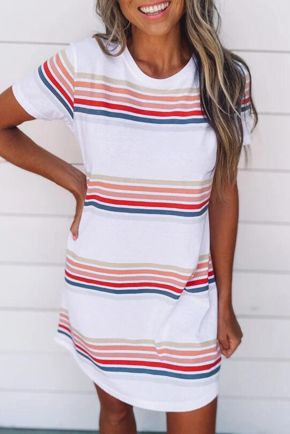 A stylish striped print round neck t-shirt mini dress displayed on a mannequin, showcasing its casual and chic design.