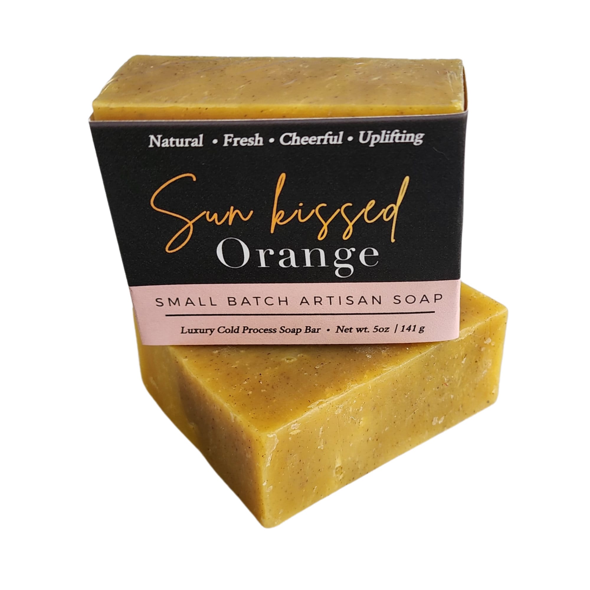 A vibrant Sun Kissed Orange Soap bar with a bright orange color, showcasing its handcrafted texture and packaging, evoking the essence of fresh Florida oranges.