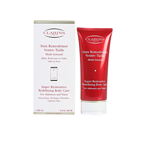 Clarins Super Restorative Redefining Body Care cream in a sleek jar, showcasing its luxurious texture and packaging.