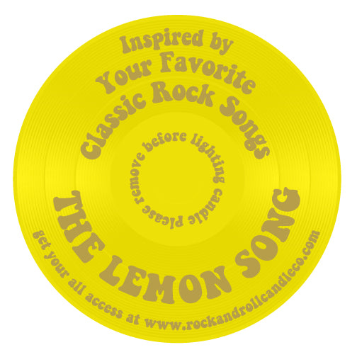 The Lemon Song candle featuring a bright yellow label with lemon graphics, showcasing its eco-friendly coconut wax and vibrant citrus scent.