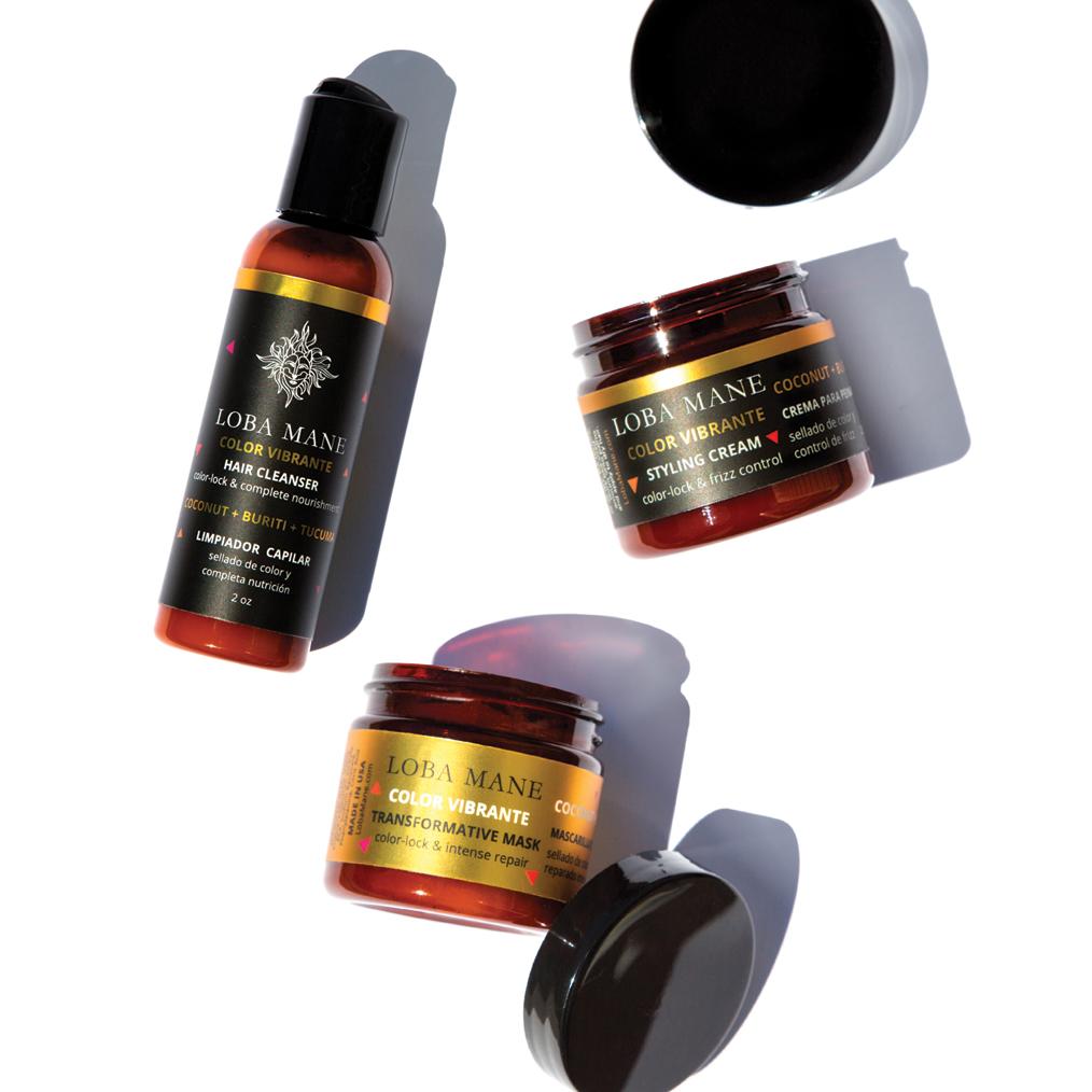 The Travel Kit featuring hair cleanser, transformative mask, and styling cream in travel-friendly sizes.