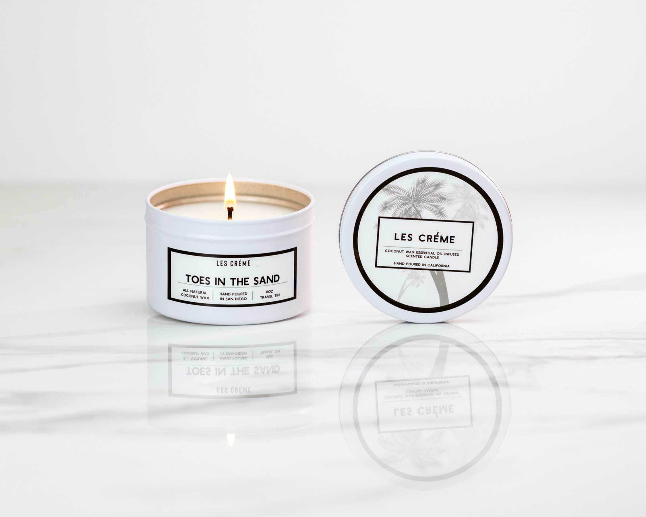 Toes in the Sand Coconut Wax Candle with floral design, showcasing its natural ingredients and elegant packaging.