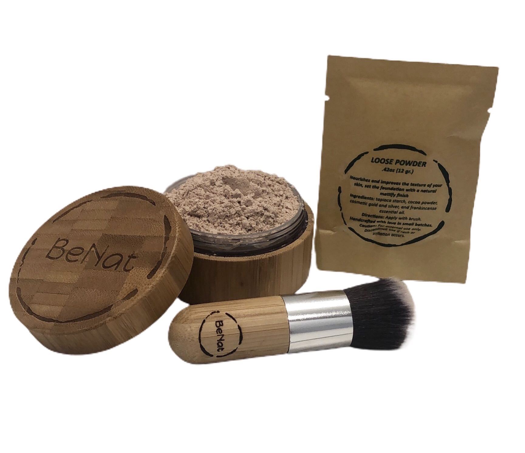 Translucent Loose Powder Set featuring a bamboo case, refill bag, and kabuki brush, showcasing eco-friendly beauty products.