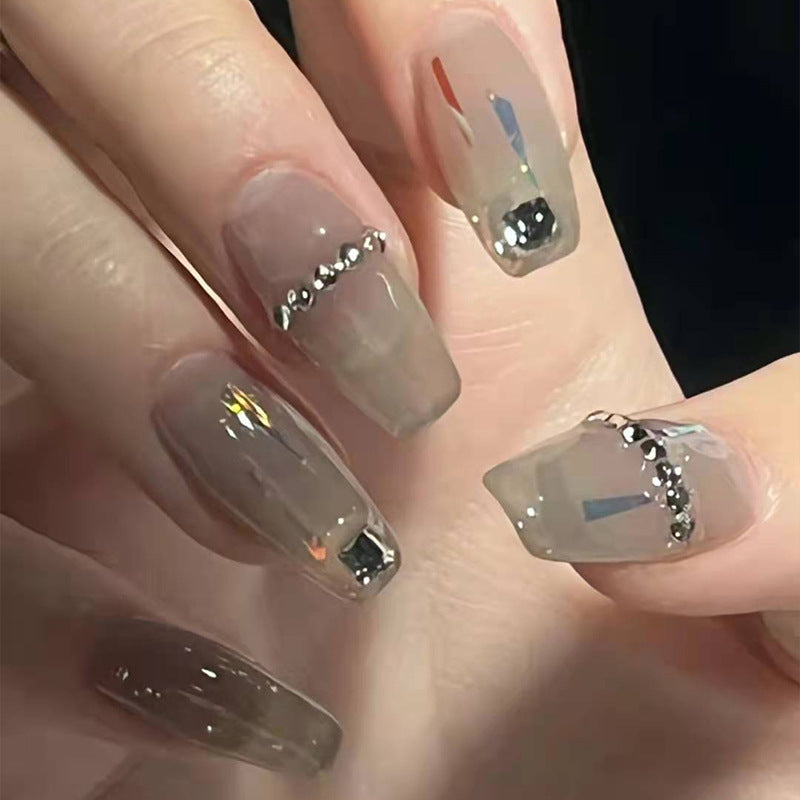 Transparent gray high-end square drill nails displayed elegantly, showcasing their chic design and perfect finish.