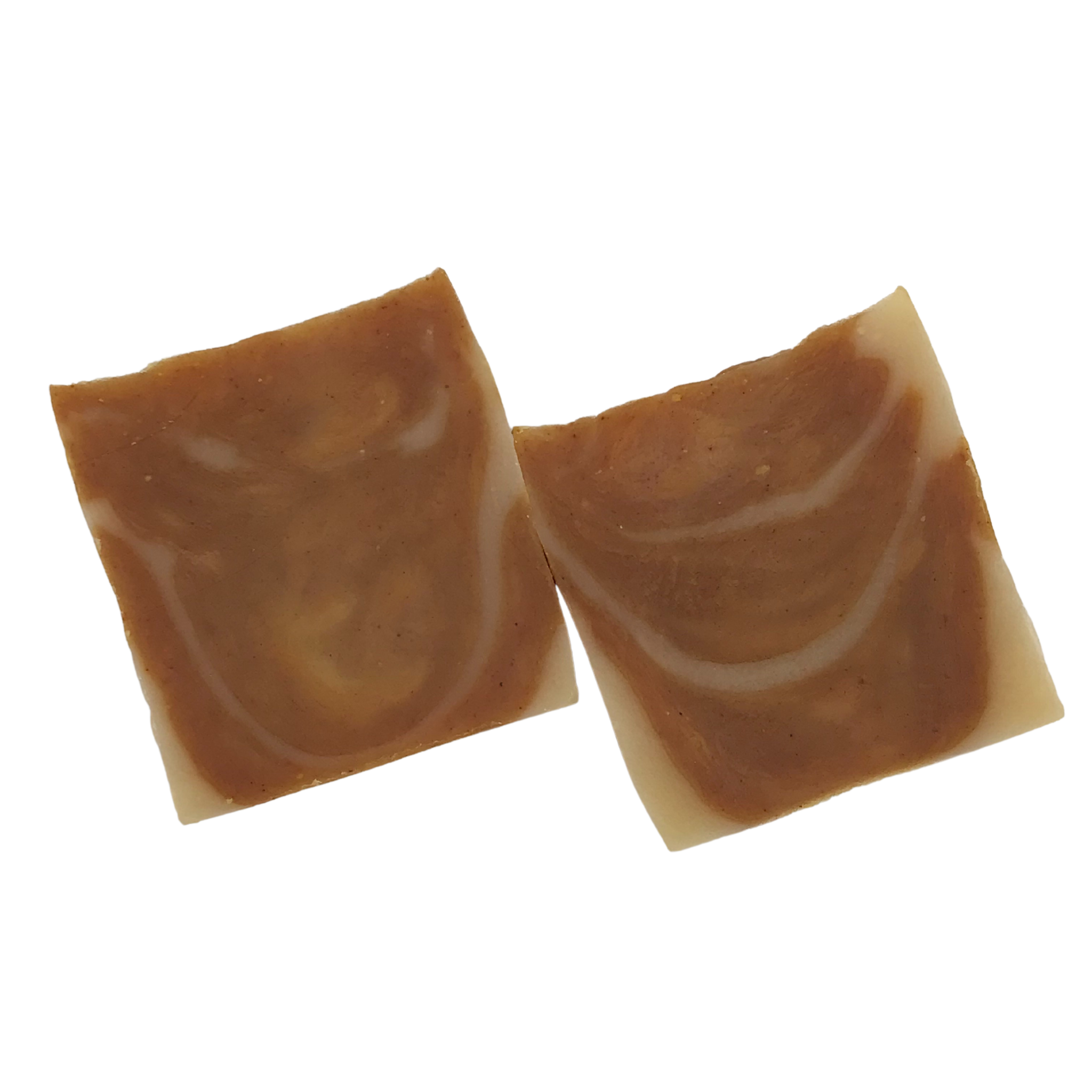 A bar of Turmeric Soap showcasing its rich golden color and natural ingredients, perfect for skincare.