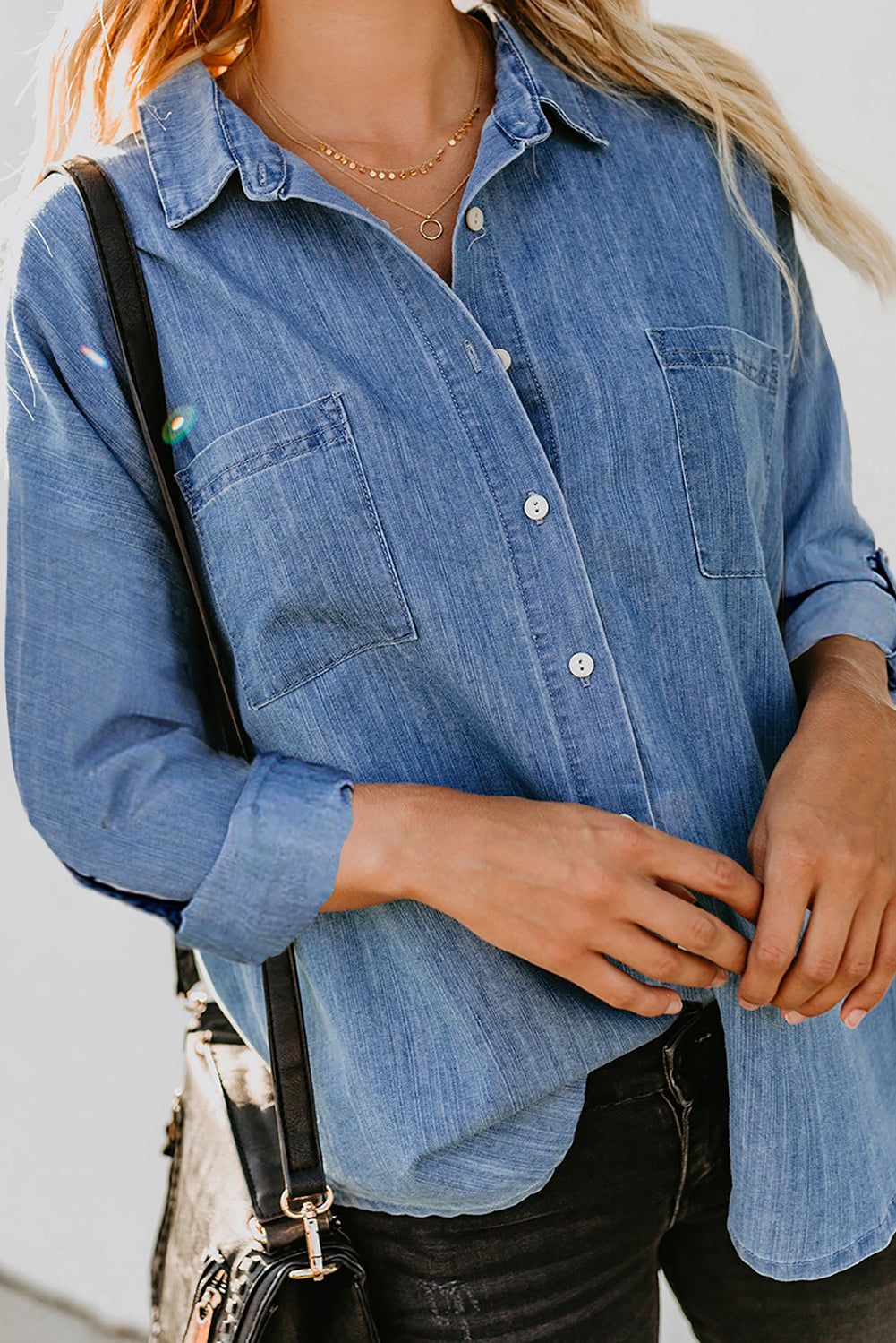 A stylish Turn Down Collar Buttoned Long Sleeve Denim Shirt featuring a classic boyfriend style, button closure, and front pocket.