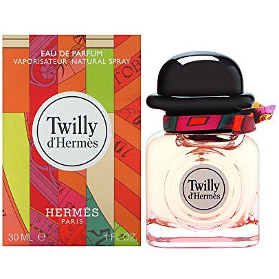 Hermès Twilly d'Eau de Parfum bottle with a silk ribbon, showcasing its elegant design.