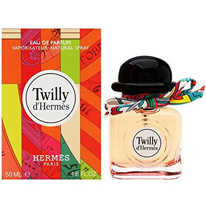 Hermès Twilly d'Eau de Parfum bottle with a silk ribbon, showcasing its elegant design.