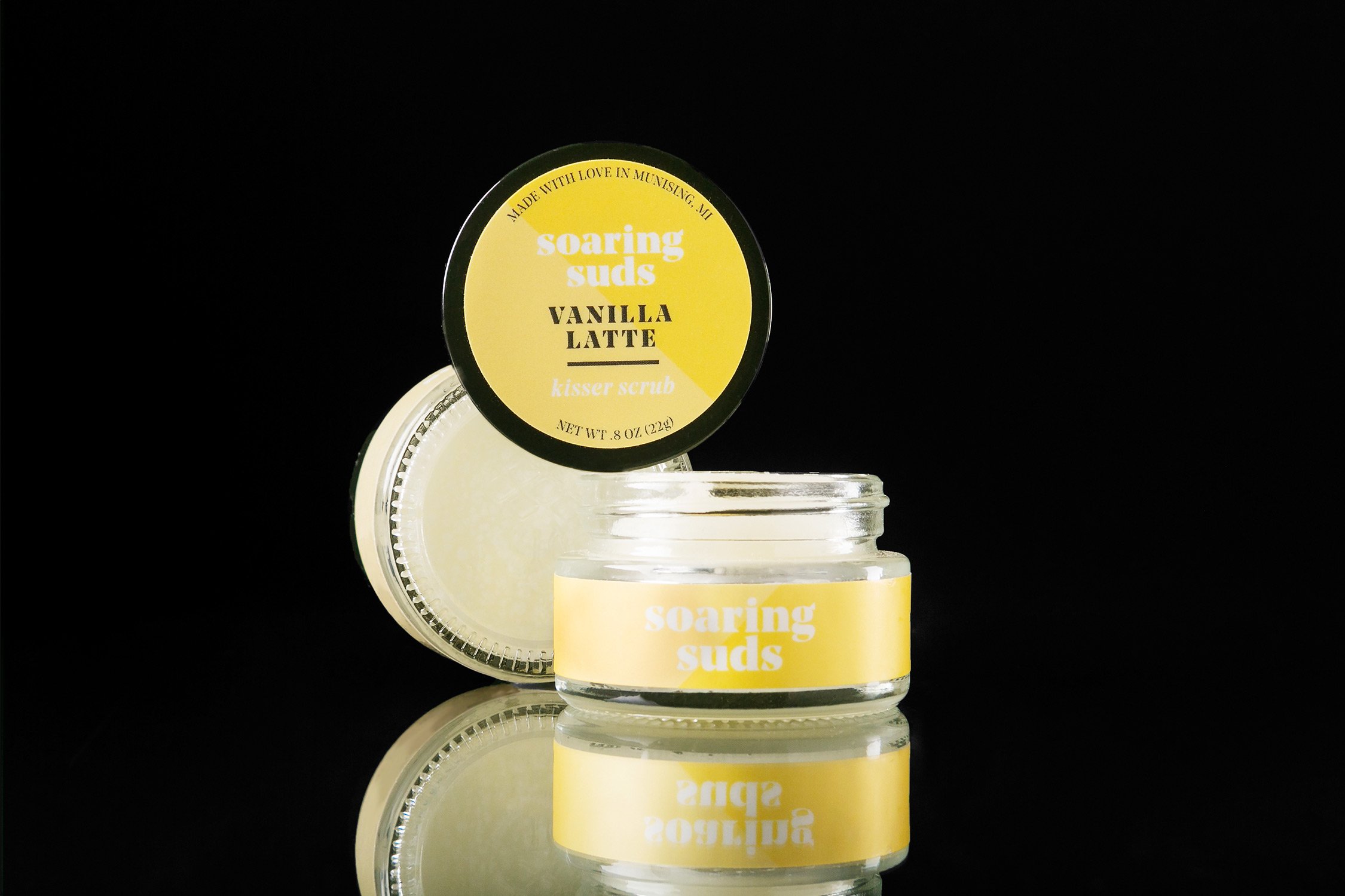 Vanilla Latte Kisser Scrub in a small jar, showcasing its creamy texture and natural ingredients.