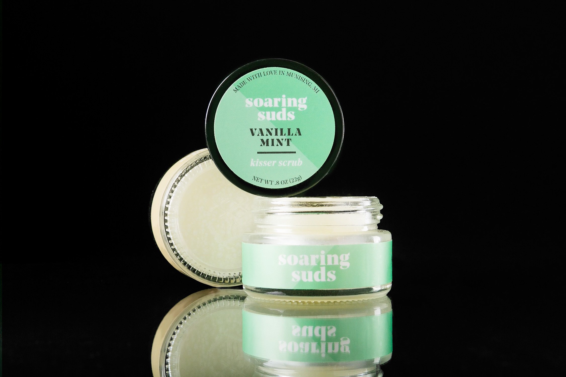 Vanilla Mint Kisser Scrub in a small jar, showcasing its creamy texture and natural ingredients.