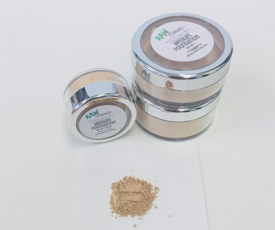 Vegan cruelty-free face powder in various shades displayed in jars, showcasing its natural mineral ingredients.