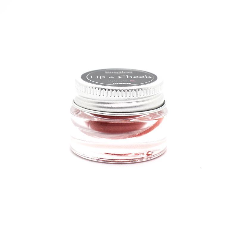 Vegan Mineral Makeup Lip and Cheek Balm in Coral, showcasing its vibrant color and eco-friendly packaging.