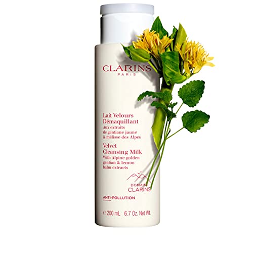 Clarins Velvet Cleansing Milk bottle with a creamy texture, ideal for gentle cleansing.