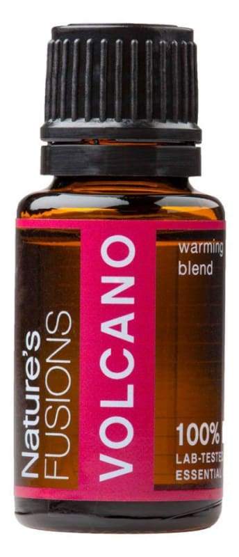 15ml bottle of Volcano Warming Blend essential oil with a warm, inviting label, surrounded by natural ingredients like ginger and cinnamon.